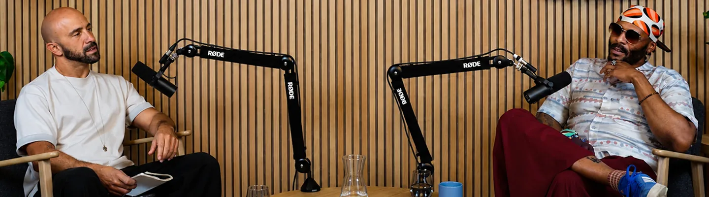 Human Journeys podcast studio with hosts and microphones